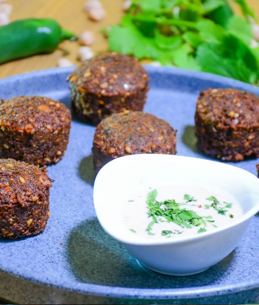 Plate Pita Falafel with Fresh Vegetables and sauce